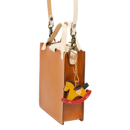 DE LAMASSU® (Alta) verticale leren mini tote met schouderband – Limited Edition